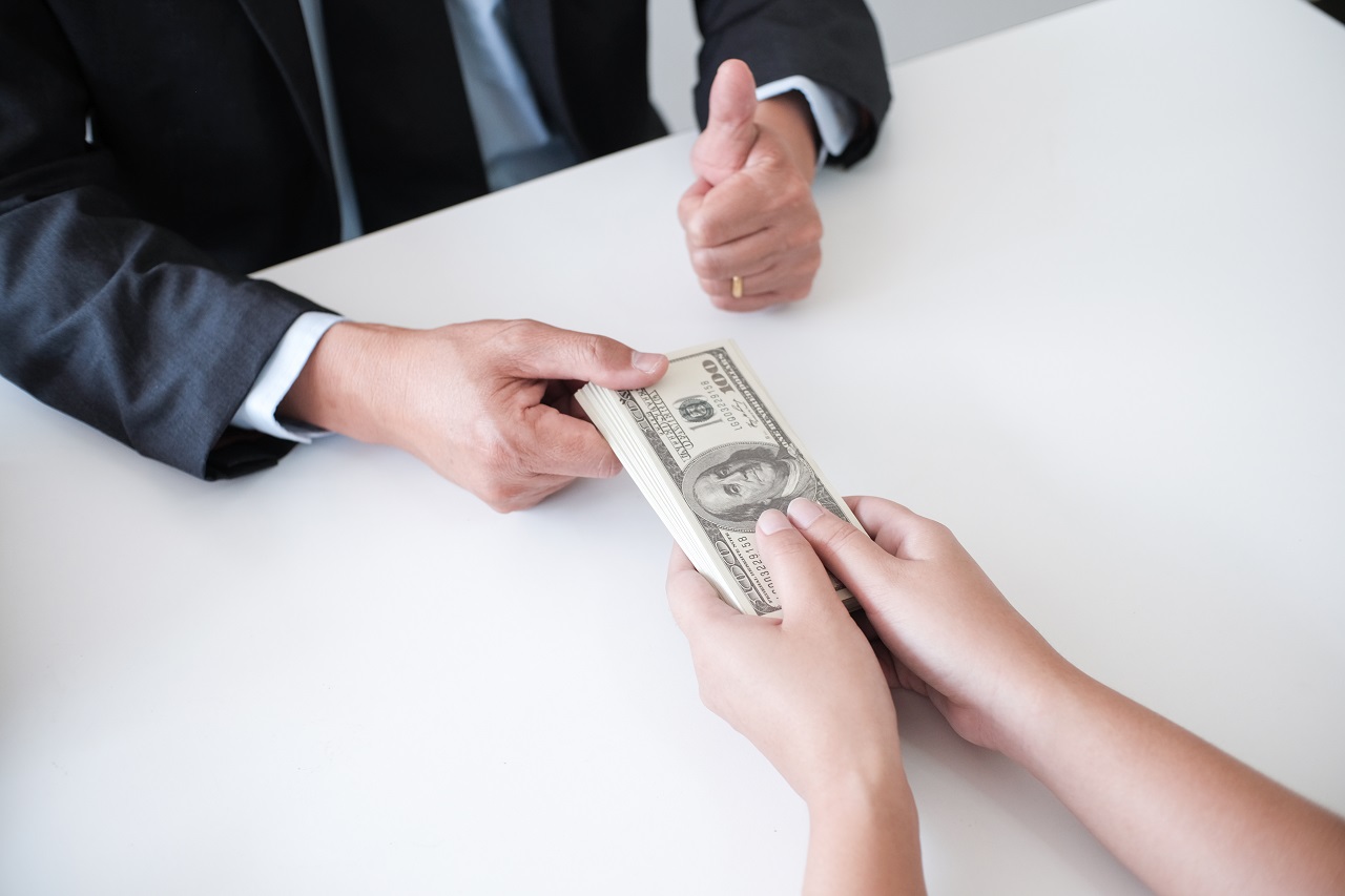 A man paying at a center