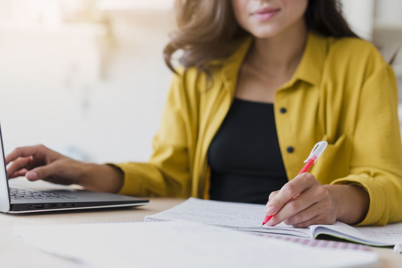 A woman listing down the assets she owns