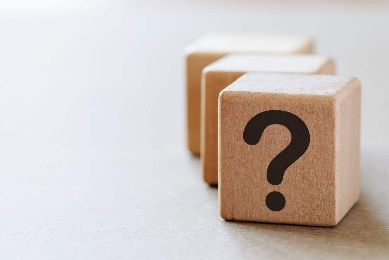 Wooden cubes with question marks