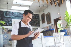 Guy working in a shop